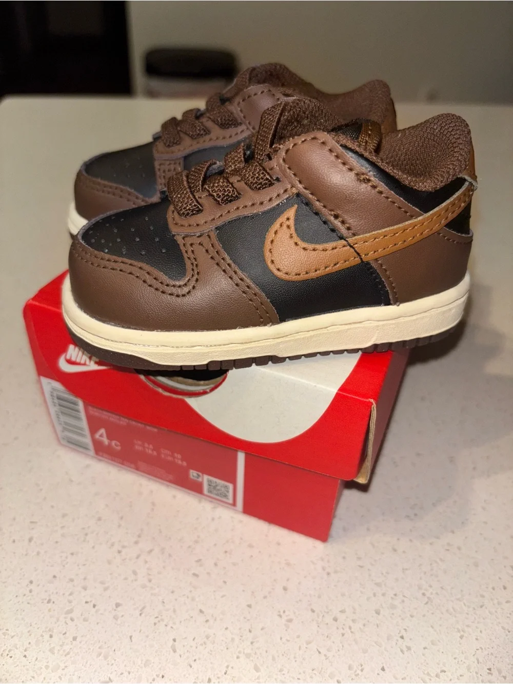 Nike Kids Low-Top Sneakers in Brown and Black with Tan Swoosh